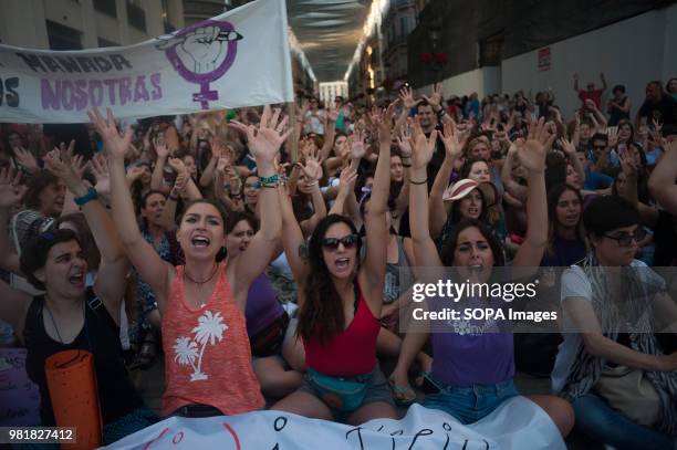 Women raise their hands during the protest. A demonstration against the last judicial resolution from the Provincial Court of Navarra that grant...