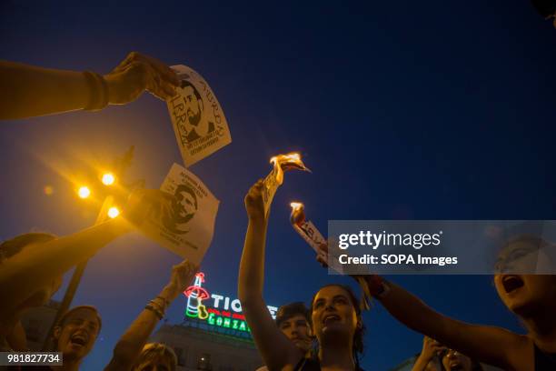 Protesters seen burning photographs of rapists. Protest in support of the rape victims from 'La Manada' or Wolf Pack gang members outside the Spanish...