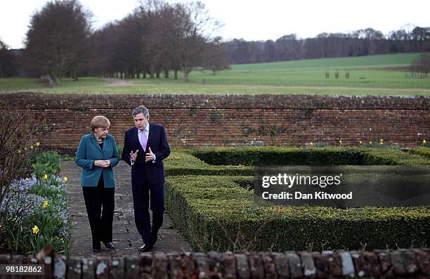 British Prime Minister Gordon Brown and German Chancellor Angela Merkel walk around the garden at Chequers, the Prime Minister's official country...