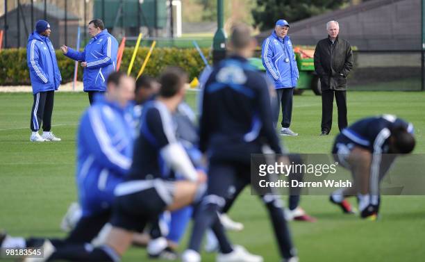 Chelsea manager Carlo Ancelotti talks to Ivory Coast manager Sven-Göran Eriksson as they watch during a training session at the Cobham Training...