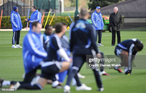 Chelsea manager Carlo Ancelotti talks to Ivory Coast manager Sven-Göran Eriksson as they watch during a training session at the Cobham Training...