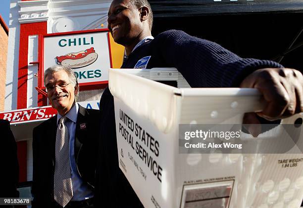 Census Bureau Director Robert Groves and Karl Griffis of the US Postal Service, wait for people to drop off their completed census forms during an...