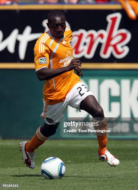 Forward Dominic Oduro of the Houston Dynamo controls the ball against FC Dallas during a MLS game at Pizza Hut Park on March 27, 2010 in Frisco,...