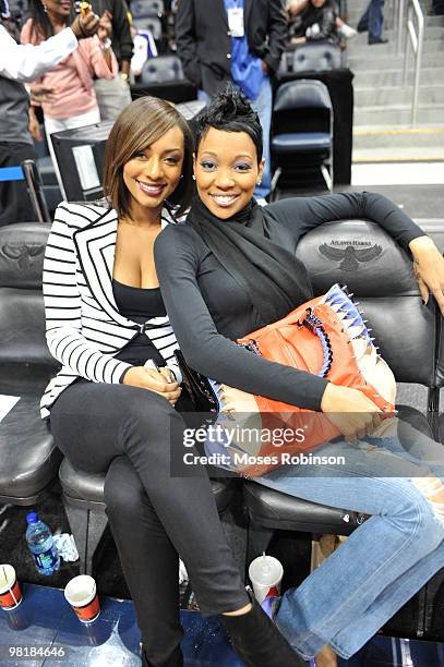 Recording Artists Keri Hilson and Monica attend the Los Angeles Lakers vs Atlanta Hawks game at Philips Arena on March 31, 2010 in Atlanta, Georgia.