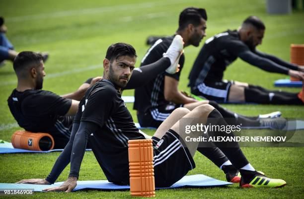 Iran's defender Pejman Montazeri does ground exercice during a training session in Bakovka outside Moscow on June 23 ahead of the 2018 World Cup...