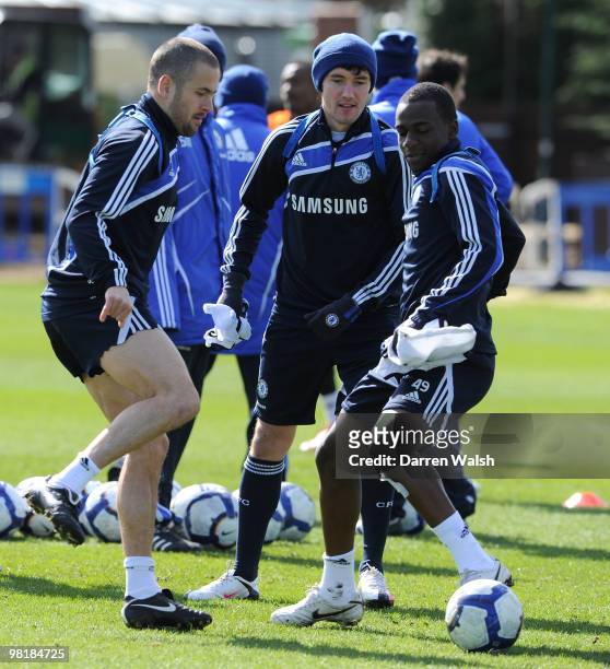 Gael Kakuta, Joe Cole and Yury Zhirkov of Chelsea during a training session at the Cobham Training Ground on April 1, 2010 in Cobham, England.