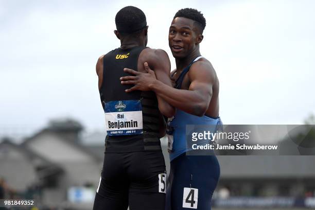 Kenny Salmon of the North Carolina Tar Heels congratulates Rai Benjamin of the USC Trojans after his victory in the 400 meter hurdles during the...