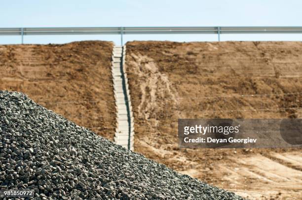 asphalt and asphalting the road - asphalting stock pictures, royalty-free photos & images