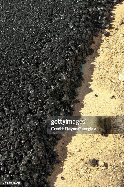 asphalt and asphalting the road - asphalting stock pictures, royalty-free photos & images