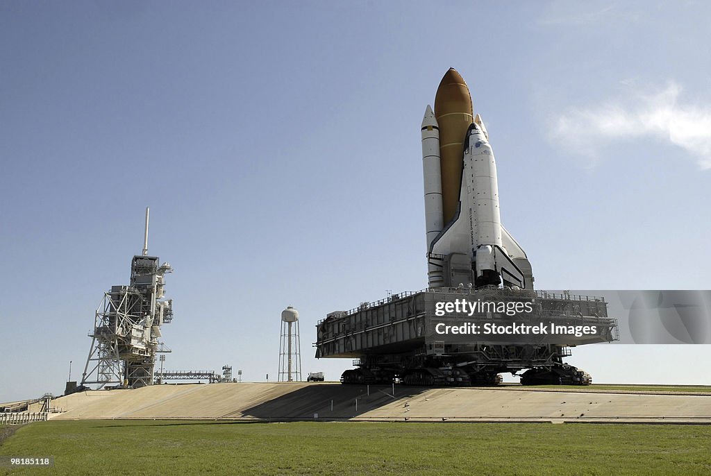 Space Shuttle Endeavour approaches the launch pad at Kennedy Space Center.