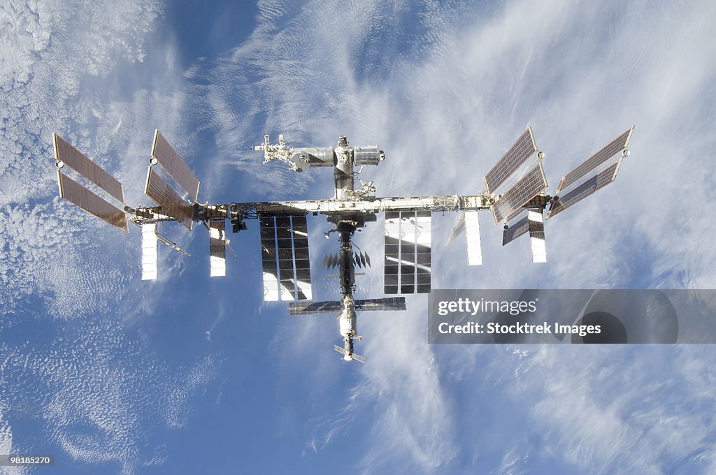 International Space Station backdropped against Earth.