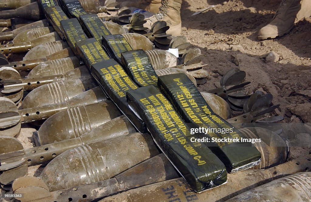 Scattered artillery assigned to Explosive Ordnance Disposal (EOD) in Al Faw, Iraq.