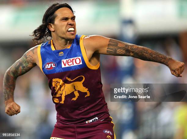 Allen Christensen of the Lions celebrates a goal during the round 14 AFL match between the Brisbane Lions and the Greater Western Sydney Giants at...