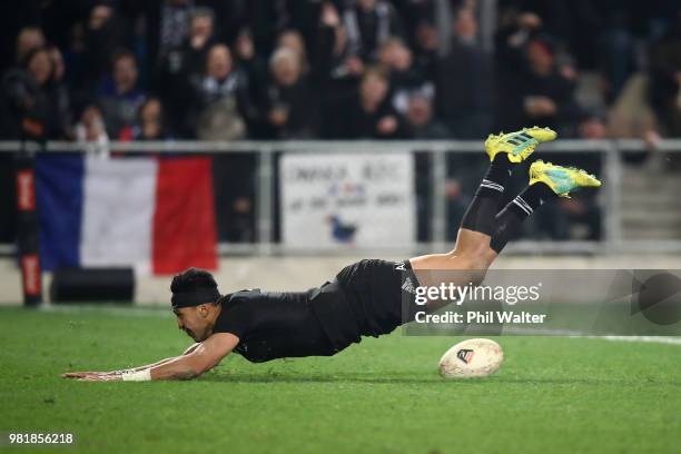 Reiko Ioane of the All Blacks scores a try during the International Test match between the New Zealand All Blacks and France at Forsyth Barr Stadium...