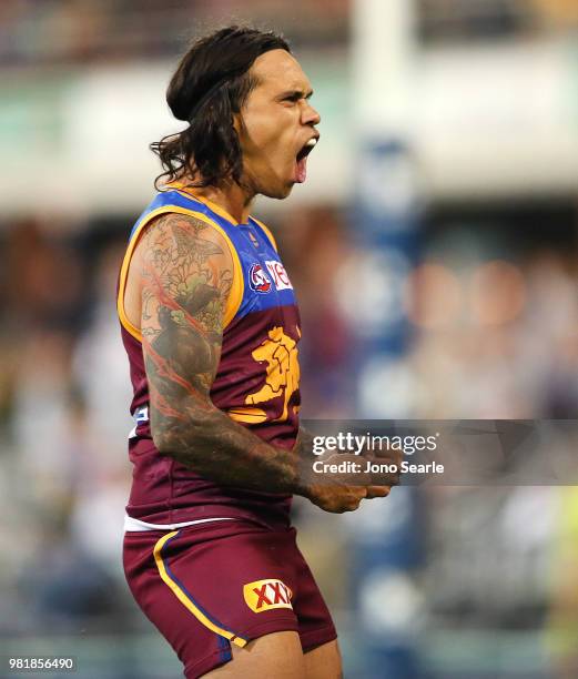 Allen Christensen of the Lions celebrates a goal during the round 14 AFL match between the Brisbane Lions and the Greater Western Sydney Giants at...