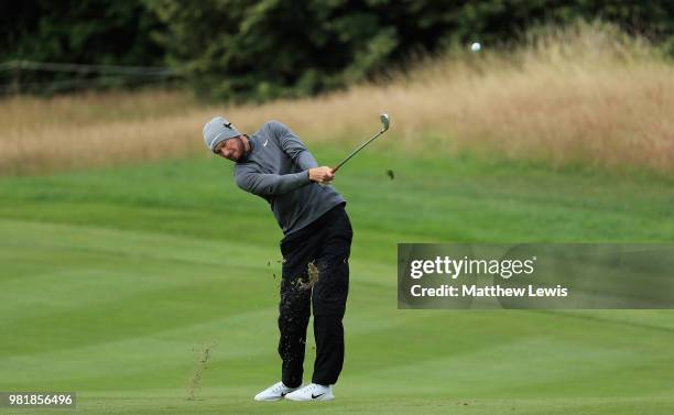 Chris Wood of England plays his second shot from the 1st fairway during day three of the BMW International Open at Golf Club Gut Larchenhof on June...