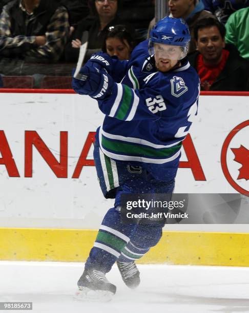 Henrik Sedin of the Vancouver Canucks takes a shot during the game against the Phoenix Coyotes at General Motors Place on March 30, 2010 in...