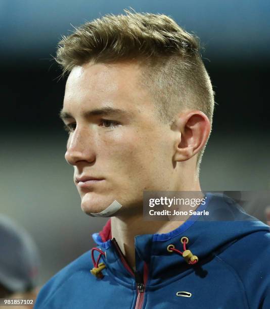 Harris Andrews of the Lions looks on after his injury during the round 14 AFL match between the Brisbane Lions and the Greater Western Sydney Giants...