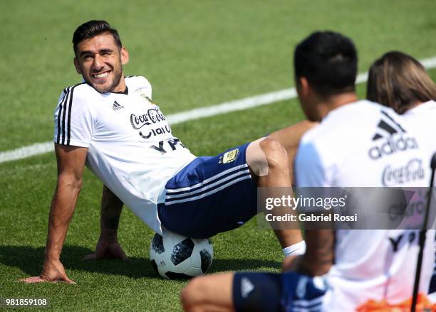 Eduardo Salvio of Argentina smiles during a training session at Stadium of Syroyezhkin sports school on June 23, 2018 in Bronnitsy, Russia.