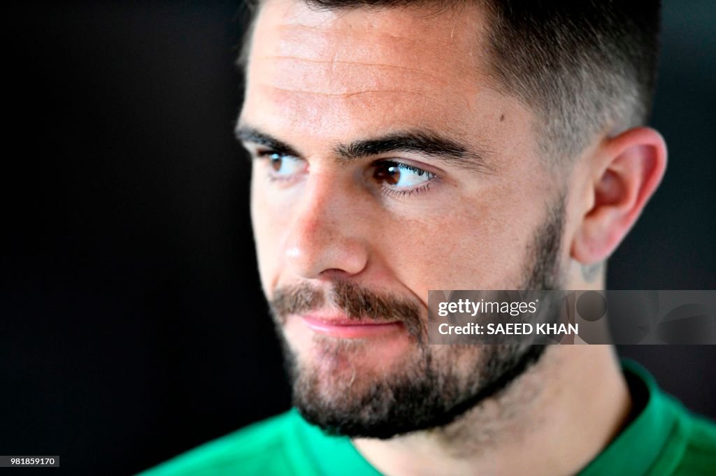 Australia's defender Joshua Risdon leaves after a press conference in ...
