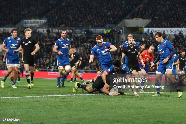 Rieko Ioane of the All Blacks dives over to score a try during the International Test match between the New Zealand All Blacks and France at Forsyth...