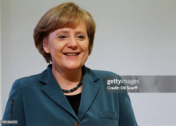 The German Chancellor Angela Merkel addresses the Royal Society after receiving the King Charles II medal in the Royal Society headquarters on April...