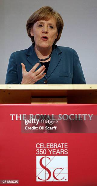 The German Chancellor Angela Merkel addresses the Royal Society after receiving the King Charles II medal in the Royal Society headquarters on April...