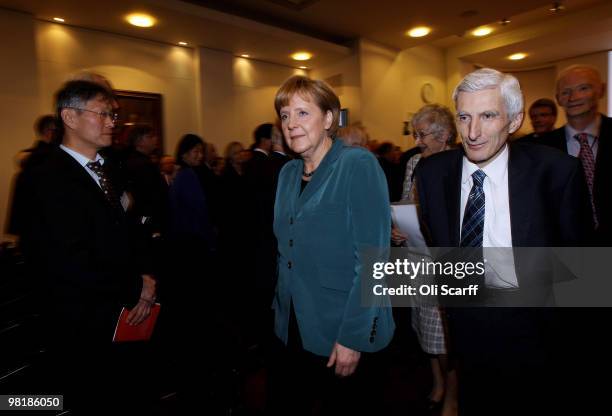 The German Chancellor Angela Merkel and Lord Rees of Ludlow , the President of the Royal Society, leave the Royal Society headquarters after Ms...