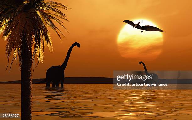 dinosaurs in primeval times - dinosauri foto e immagini stock