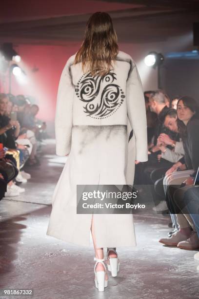 Model walks the runway during the WWWW SSS World Corp Menswear Spring/Summer 2019 show as part of Paris Fashion Week on June 22, 2018 in Paris,...