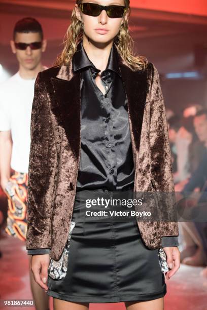 Model walks the runway during the WWWW SSS World Corp Menswear Spring/Summer 2019 show as part of Paris Fashion Week on June 22, 2018 in Paris,...