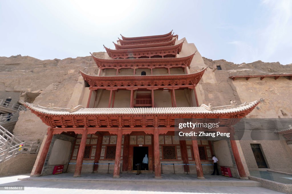 The highest building in Mogao cave, with 9 floor height, is...