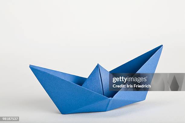 an origami boat - oragami bildbanksfoton och bilder