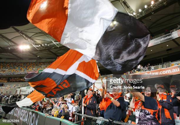 Fans celebrate the win during the round 14 AFL match between the Brisbane Lions and the Greater Western Sydney Giants at The Gabba on June 23, 2018...
