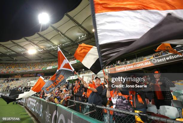 Fans celebrate the win during the round 14 AFL match between the Brisbane Lions and the Greater Western Sydney Giants at The Gabba on June 23, 2018...