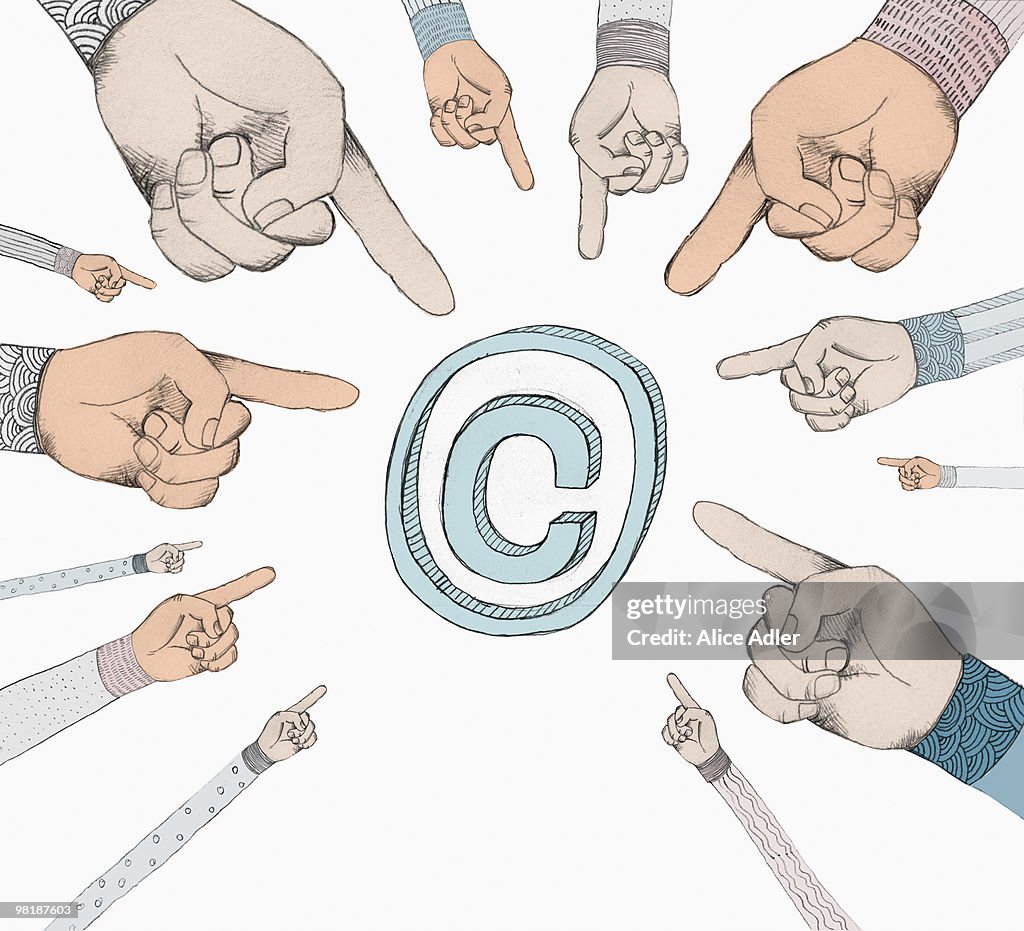 Hands pointing to a copyright symbol
