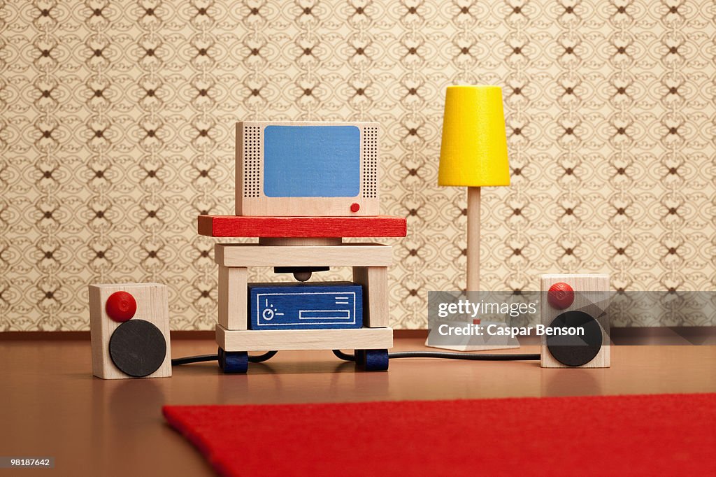 Miniature wooden television and stereo speakers
