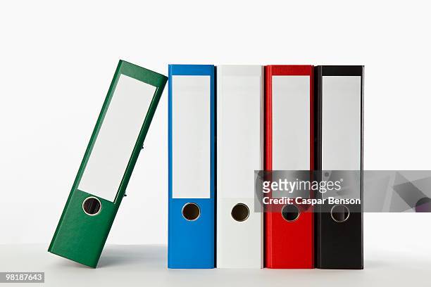 five colored ring binders - folders stock-fotos und bilder