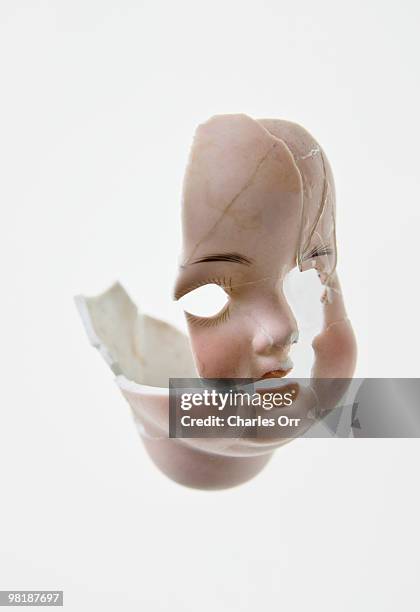 pieces of the head of a doll - broken figurine stock pictures, royalty-free photos & images