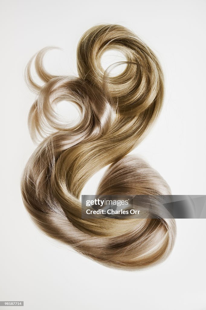 Two blond hair pieces