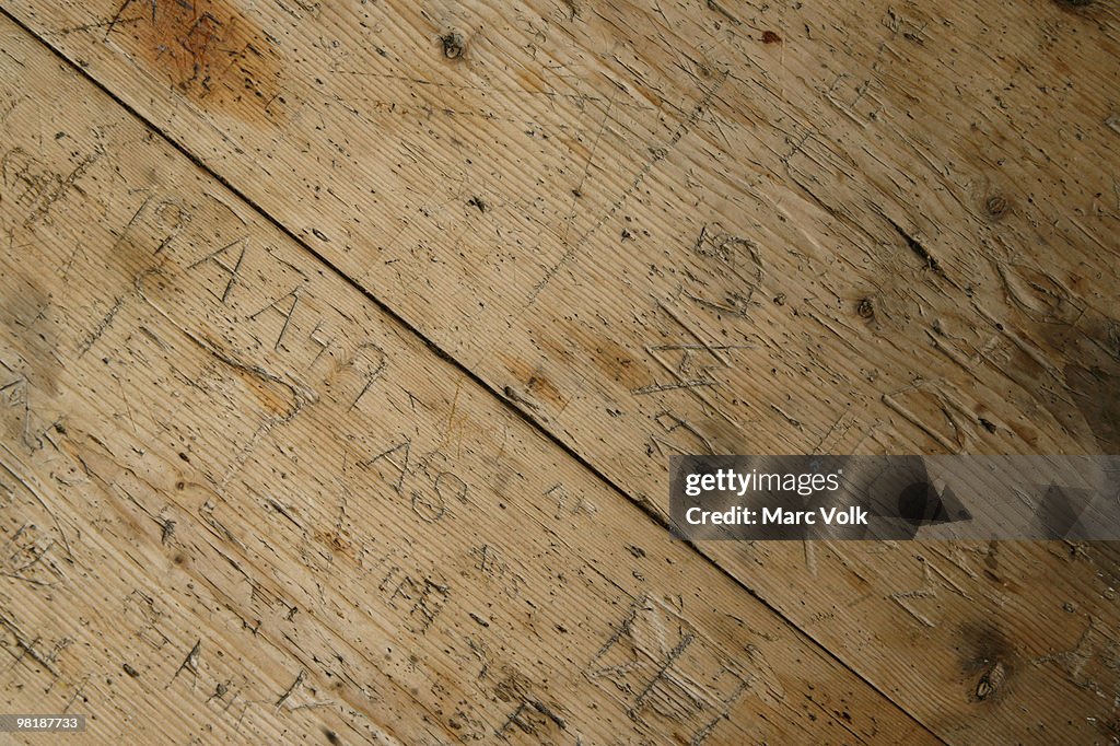 Detail of inscriptions in a wooden table