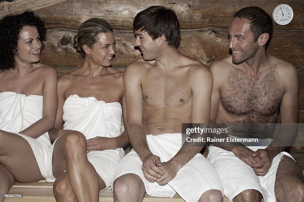 Four friends in a sauna