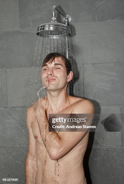 a man taking a shower - man spitting stock pictures, royalty-free photos & images