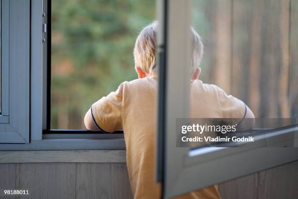 Kid Opening Window Kid Open Windows Photos and Premium High Res Pictures - Getty Images