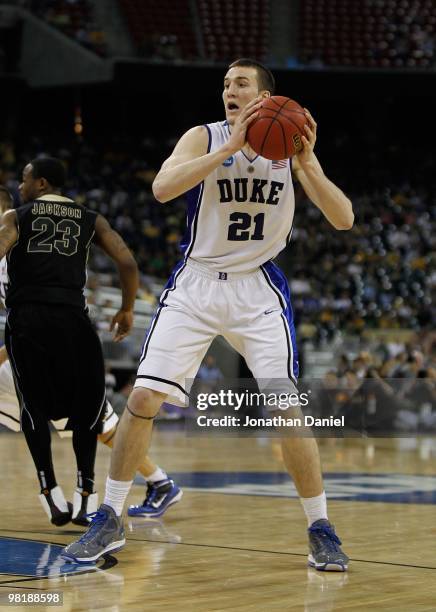 Miles Plumlee of the Duke Blue Devils looks to pass against the Purdue Boilermakers during the south regional semifinal of the 2010 NCAA men's...