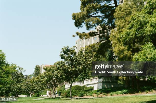 Students walk on tree lined paths near Sather Tower on the campus of UC Berkeley in downtown Berkeley, California, May 21, 2018.