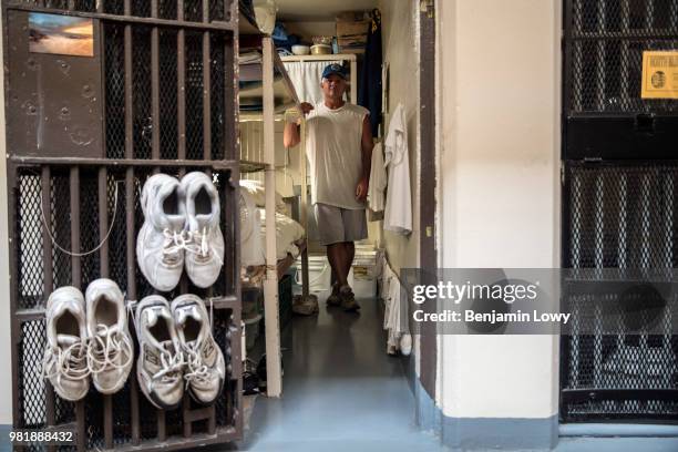 San Quentin Prison, CA Darren Settlemeyer poses in his prison cell, his home for the rest of his life baring an institution change or move in San...