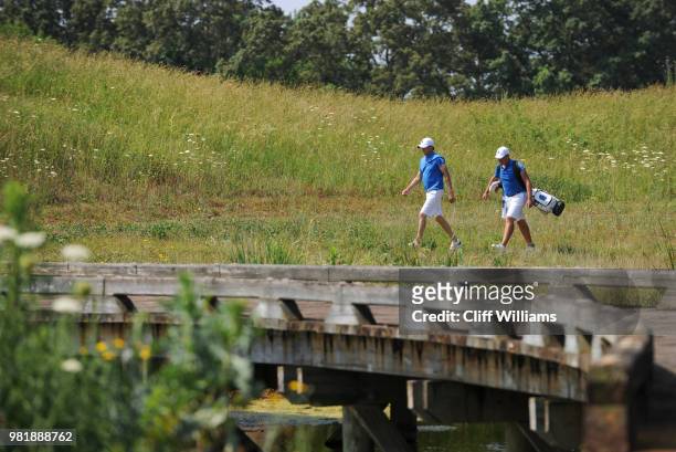 West Florida Coach Steve Fell and West Florida's Henry Westmoreland during the Division II Men's Team Match Play Golf Championship held at the Robert...