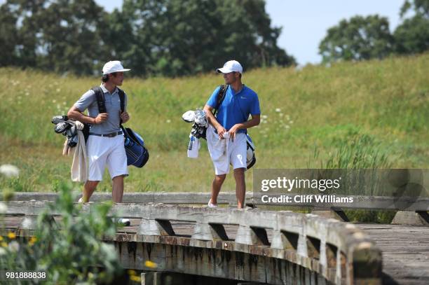 Lynn's Carlos Bustos and West Florida's Chandler Blanchet during the Division II Men's Team Match Play Golf Championship held at the Robert Trent...