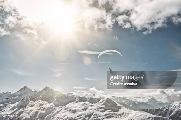 paragliding in davos, switzerland - paragliding stock pictures, royalty-free photos & images